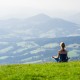 Young woman meditating outdoors